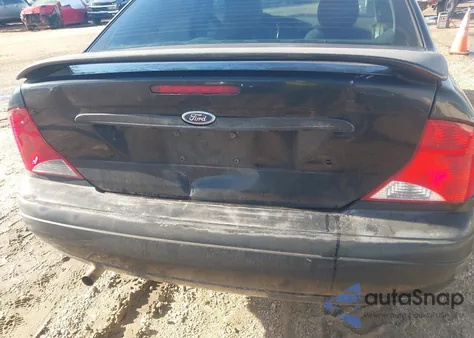 2004 Ford Focus Lx z USA, uszkodzony, nr VIN 1FAFP33Z94W194683